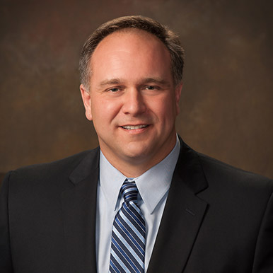 Trent P. Austin, CIC, AIC-M, AINS